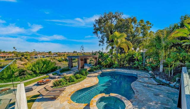 Exquisite home with pool, sauna, hot tub, 3 fireplaces, balcony, & washer/dryer