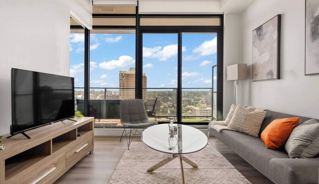High-Rise Haven | AC, VIEWS, Pool, Gym & Parking in Calgary