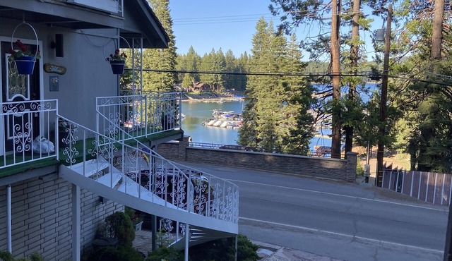 House with 6 rooms each with private bath across street from lake!