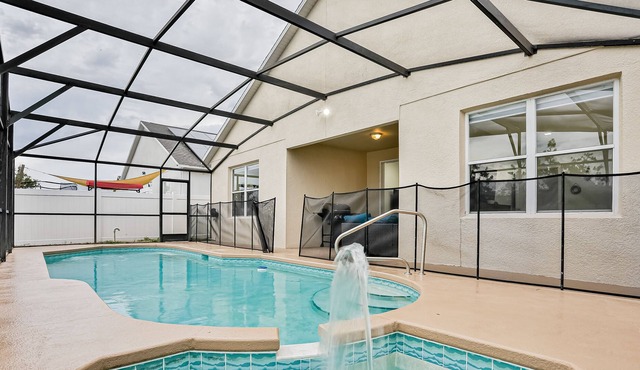 Inviting home near Disney with private pool, patio, gas grill & game area