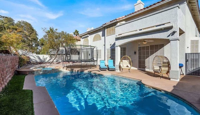 Luxe 5BR Home w/Pool, BBQ, EV Charger Near Strip!
