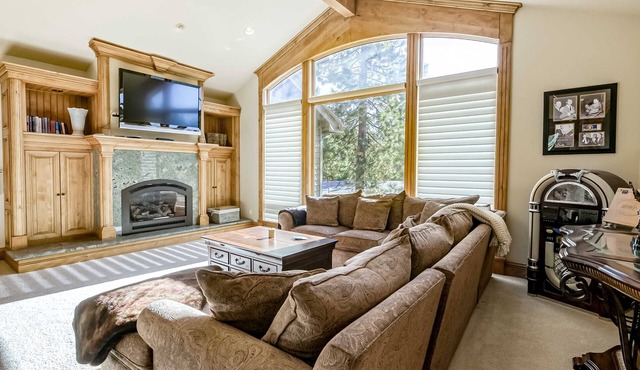 Luxury home with fireplaces, AC, home office, & 2-car garage, sleeps 10