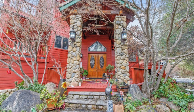Majestic Riverfront Chalet is set down a serene and private drive.