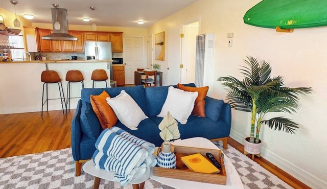 Ocean-view home in great location with backyard deck, grill, streaming, & W/D