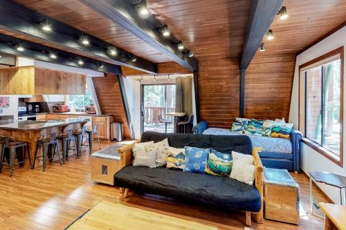 Quiet dog-friendly home in the woods with deck & fireplace - near the lake