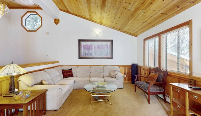Rustic home with wood stove, deck, open floor plan, & nearby activities