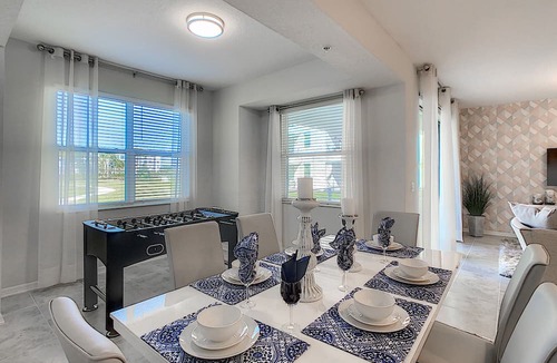 Kissimmee Condo | Modern Condo 5mi to Disney, Foosball, Giant Water Slide, Free Water Park