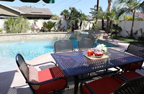 Hermosa Village House | Snazzy 6 Bedroom 3 bath pool home 1/2 mile walk to Disney