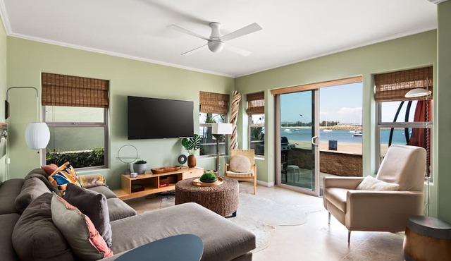 On the Sand! Bayfront Ground Floor + AC + Large Patio