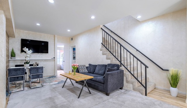 “Elegant Condo Steps from Americana”